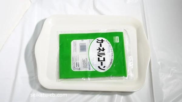 空になった業務スーパーの冷凍とうもろこしの袋